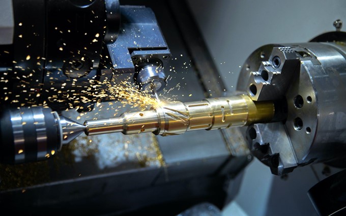 A lathe taking advantage of live tooling, to cut a part using a live center